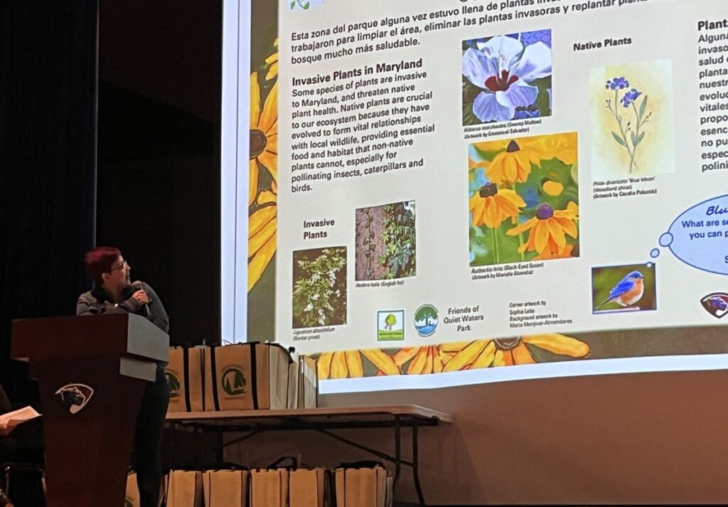 speaker with slide of invasive and native plants